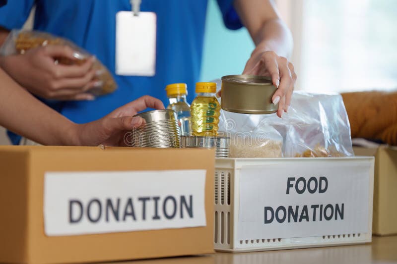 Sustainability in the Kitchen Reducing Food Waste 4 Food Donation Drive. Volunteers Packing Food Items for Community Support. Stock Photo - Image of event, assistance: 411894080